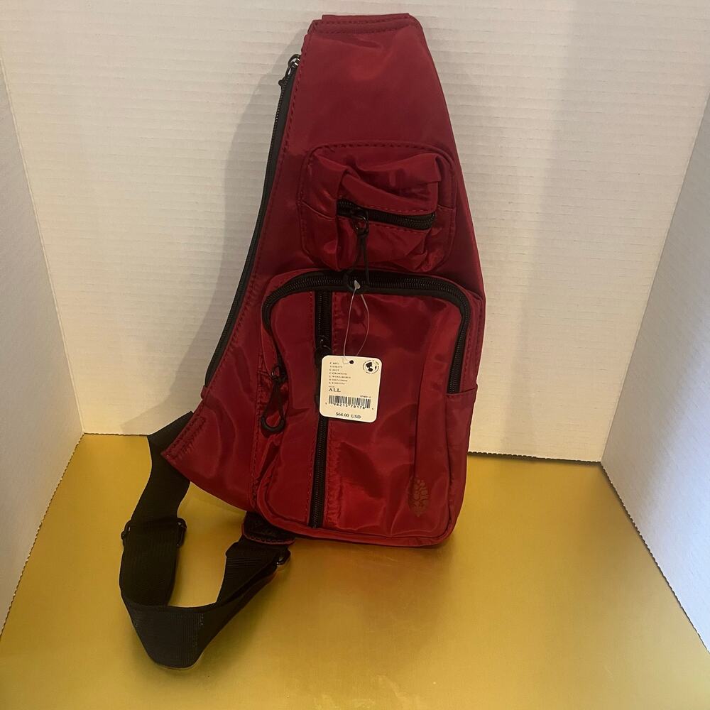 Free people Sprinter Sling Bag in crimson. One size. NWT